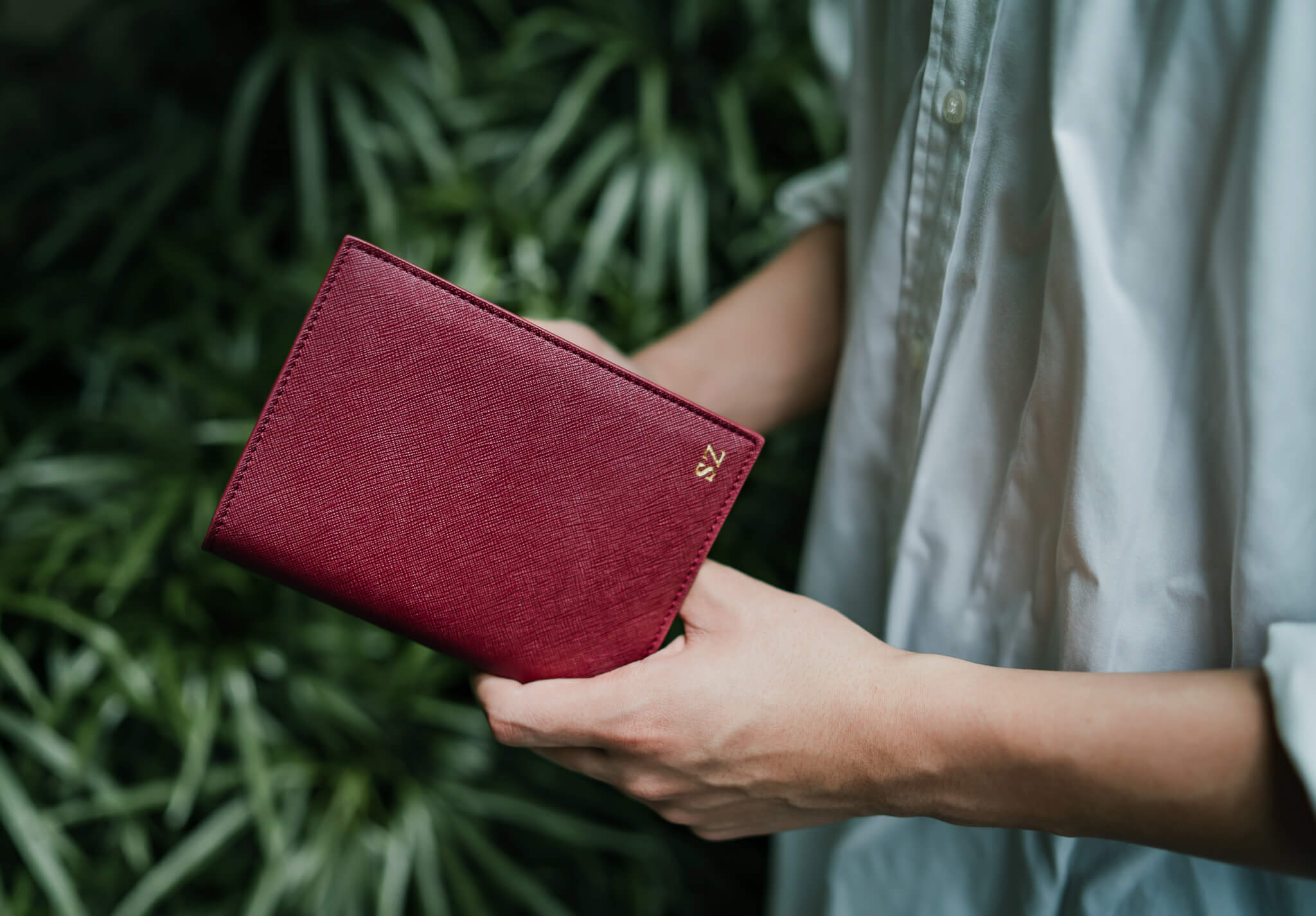 customised passport holder in burgundy