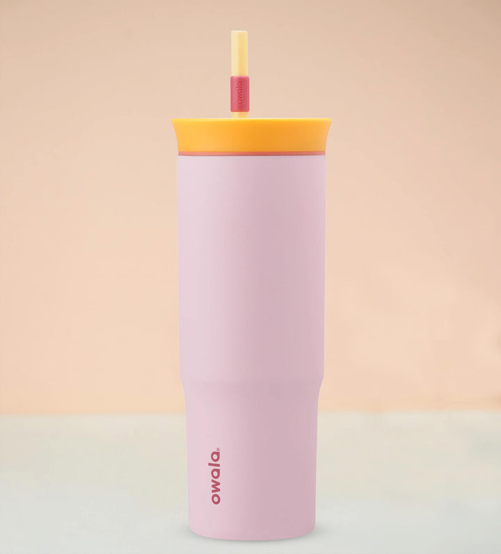 Pink water bottle with straw