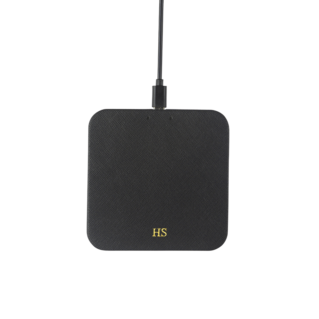 Saffiano wireless charging pad in black and with gold HS text