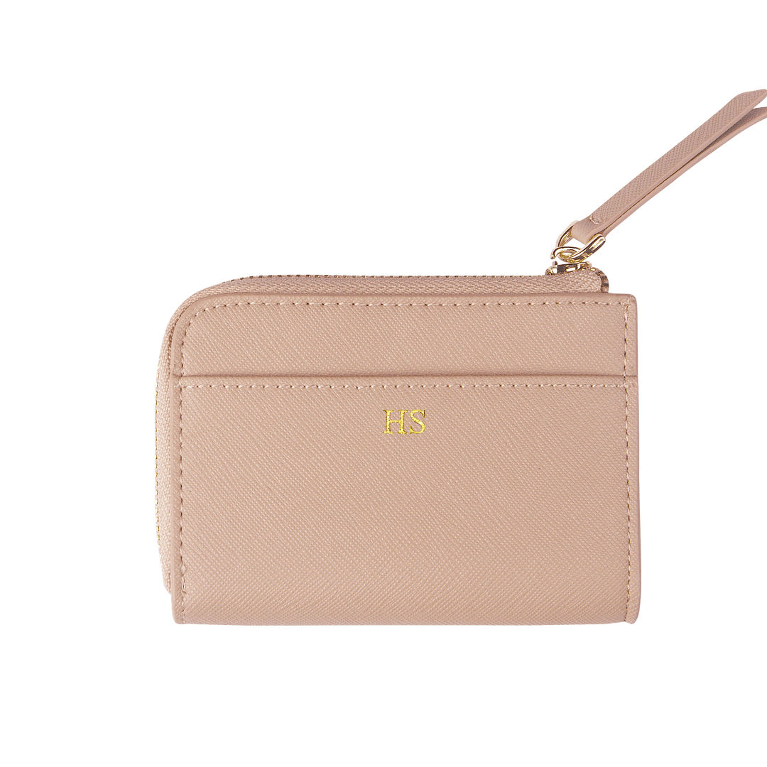 Nude custom Saffiano leather zip wallet with gold “HS” text.