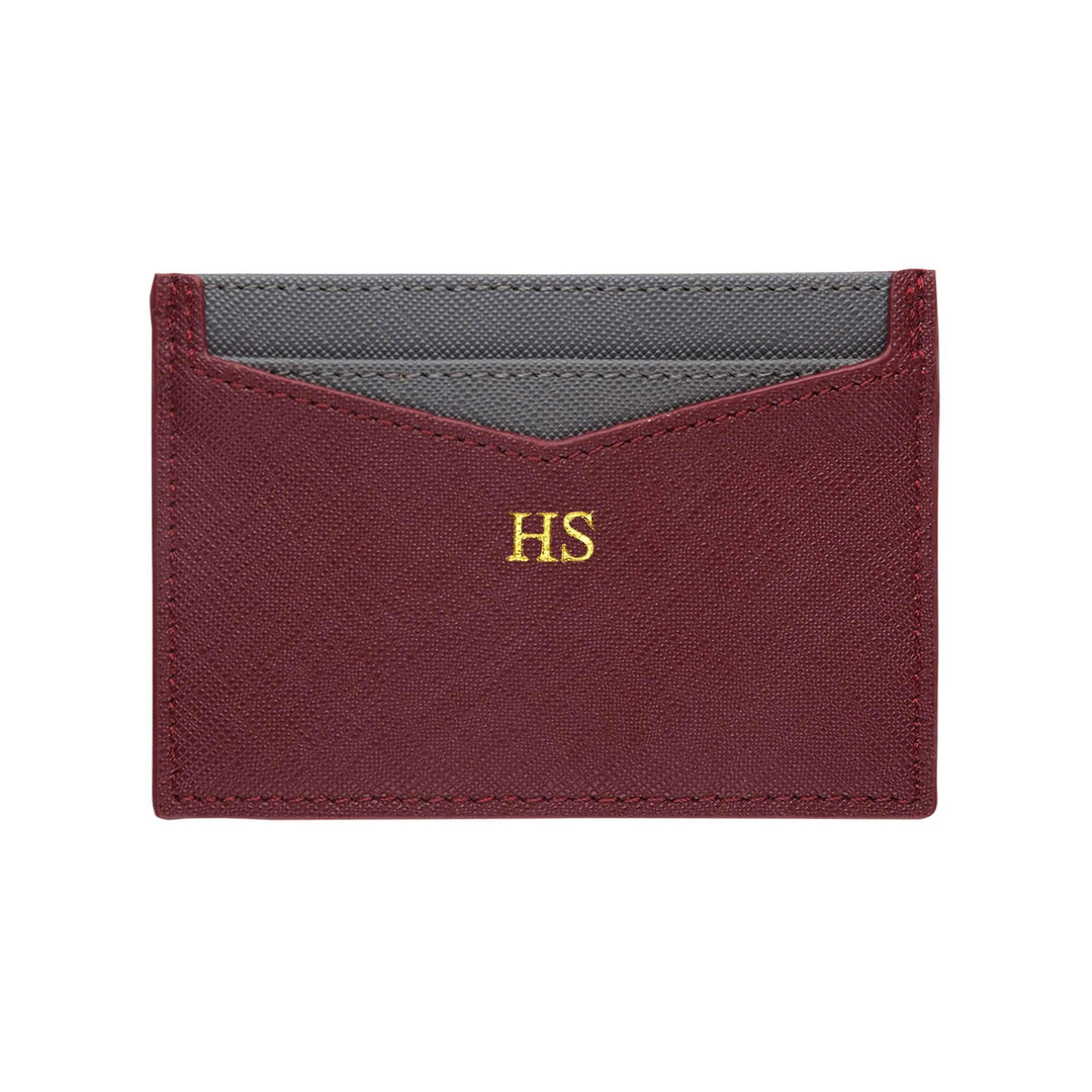 Burgundy personalised Saffiano leather cardholder wallet with gold “HS” text.
