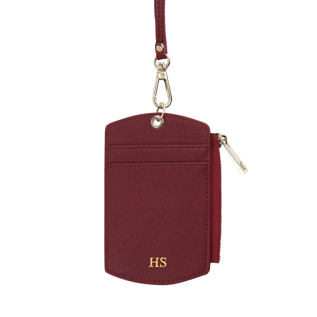 Saffiano ID cardholder lanyard in burgundy with gold HS text and side zipper