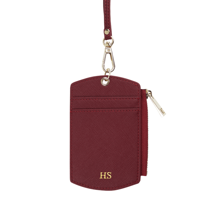 Saffiano ID cardholder lanyard in burgundy with gold HS text and side zipper