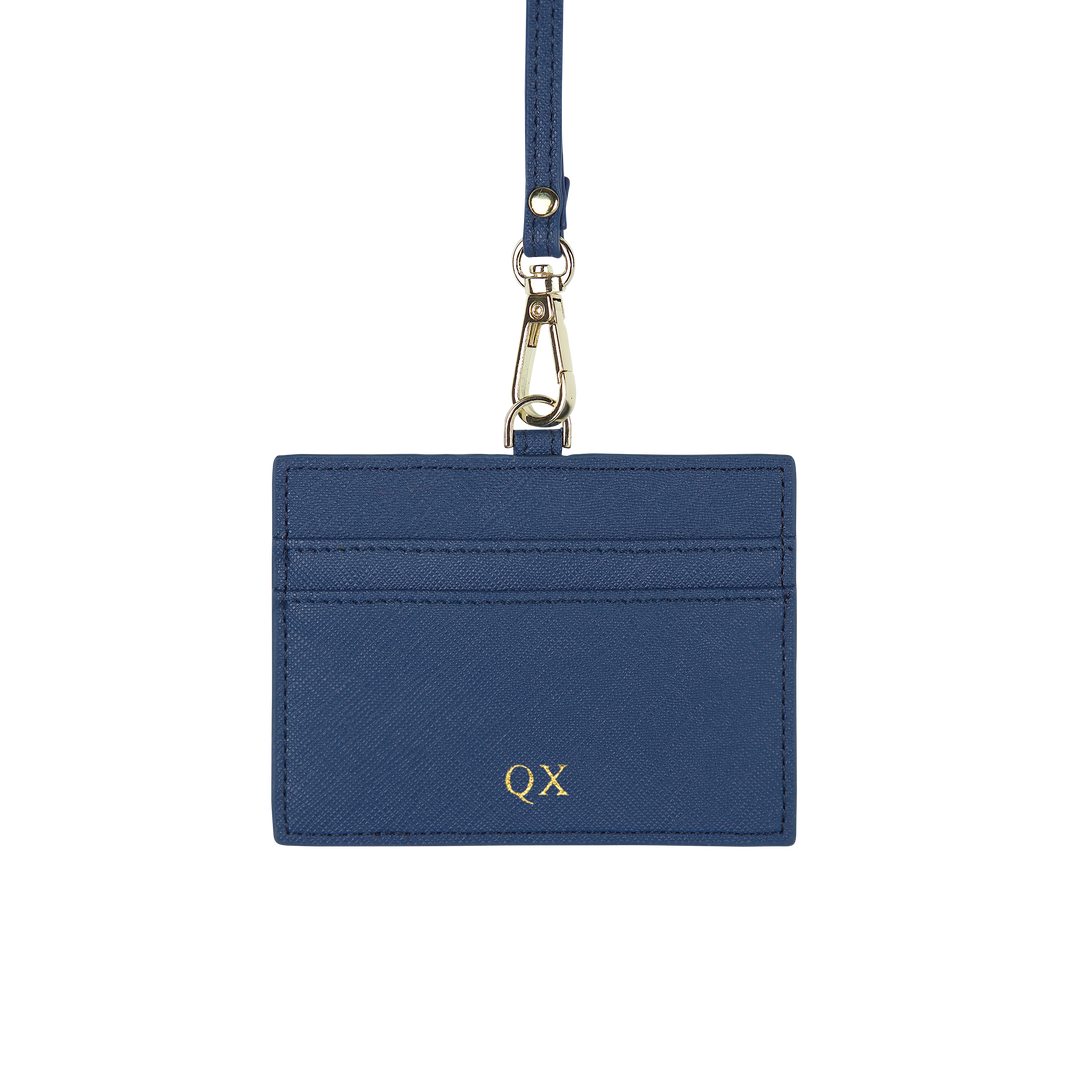 Saffiano horizontal ID cardholder lanyard in navy and with gold QX text