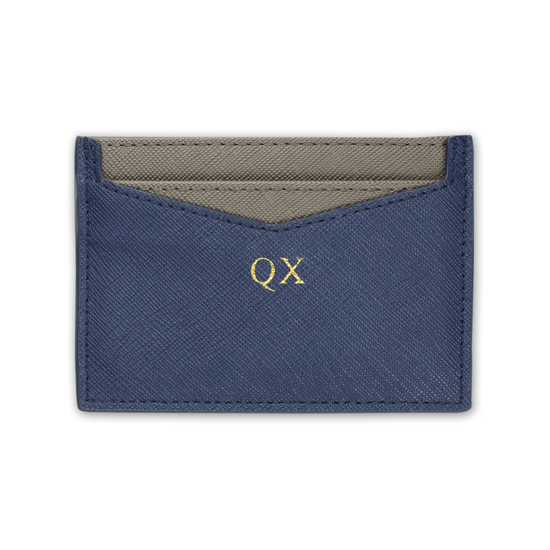 Navy custom Saffiano leather cardholder with gold “QX” text.