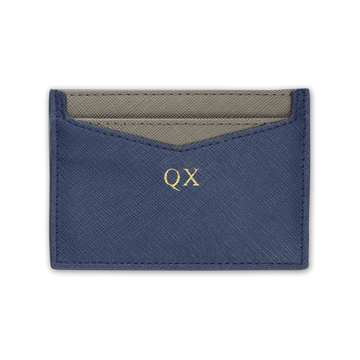 Navy custom Saffiano leather cardholder with gold “QX” text.
