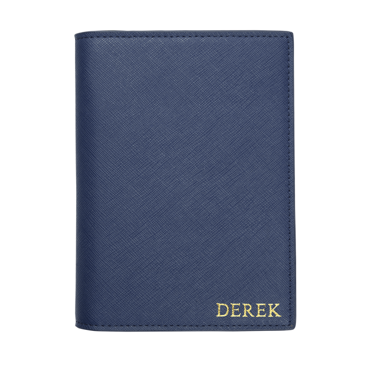 Saffiano passport cover in navy with gold derek text