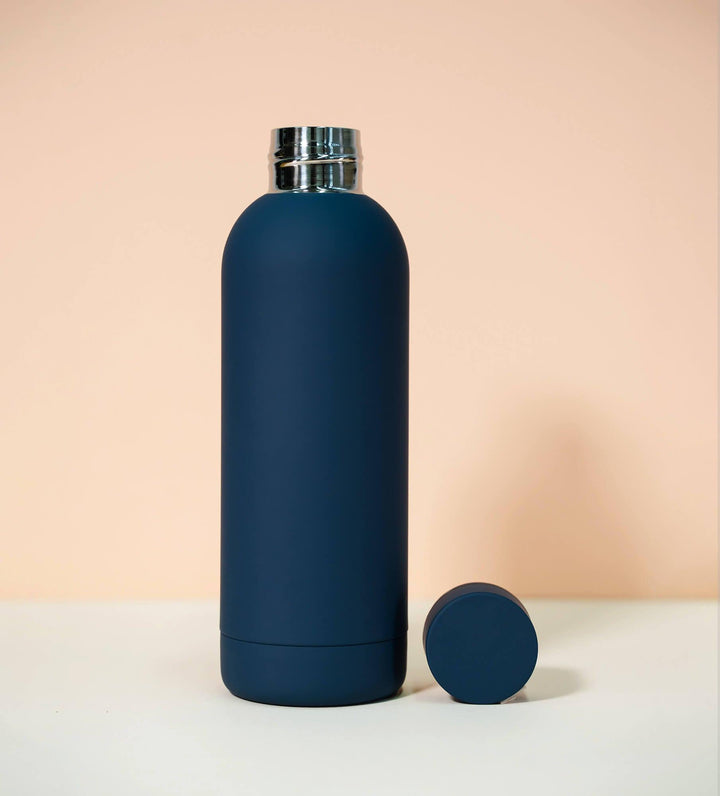 Blue thermal water bottle with blue lid