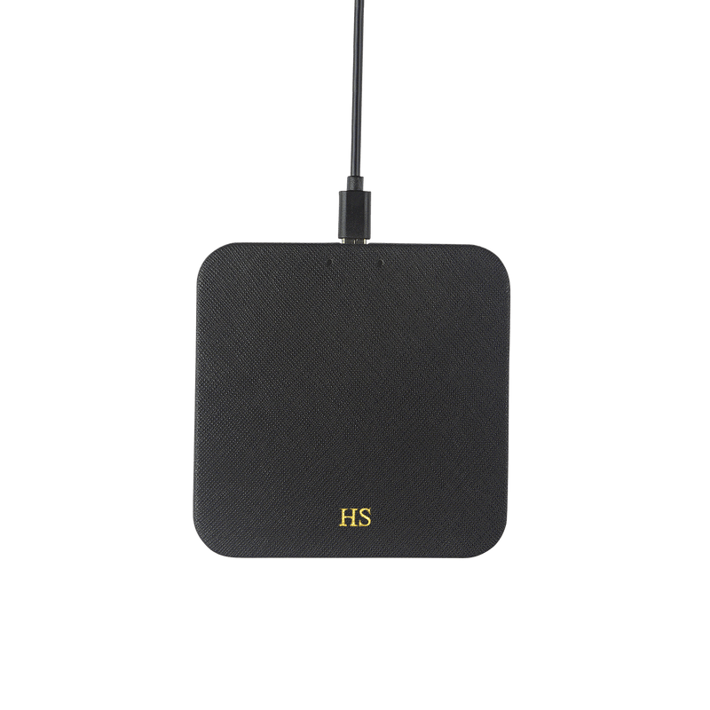 Saffiano wireless charging pad in black and with gold HS text